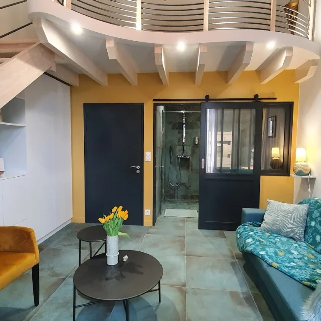 Sitting area in the Les Lichens bedroom overlooking the bathroom and mezzanine