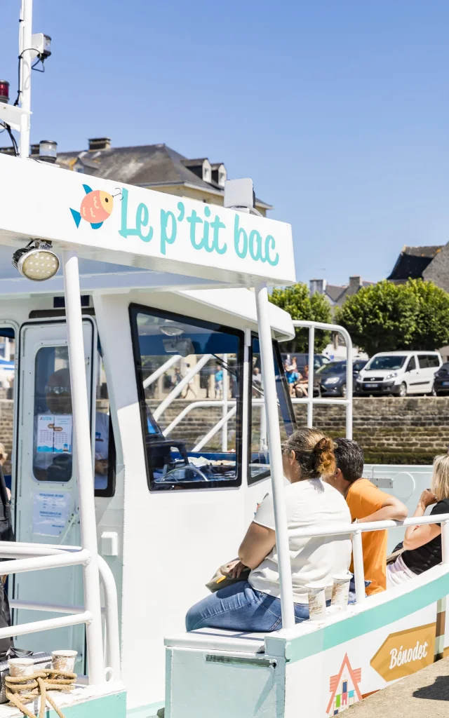 Couple ready to board the pedestrian ferry with a pushchair