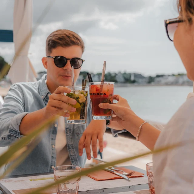 Couple enjoying a drink on the Sans Souci terrace