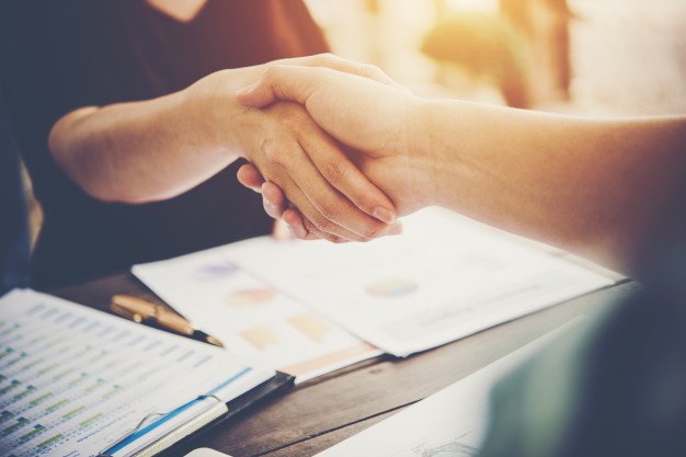 Two people shaking hands