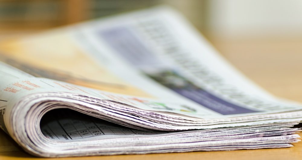 Newspapers on a table